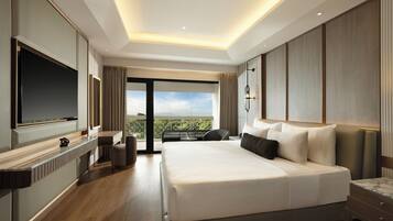 Ambarrukmo Suite | Minibar, in-room safe, desk, laptop workspace