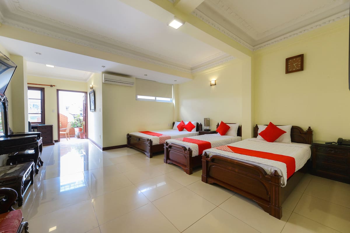 Family Room, Balcony, City View | Minibar, in-room safe, desk, laptop workspace
