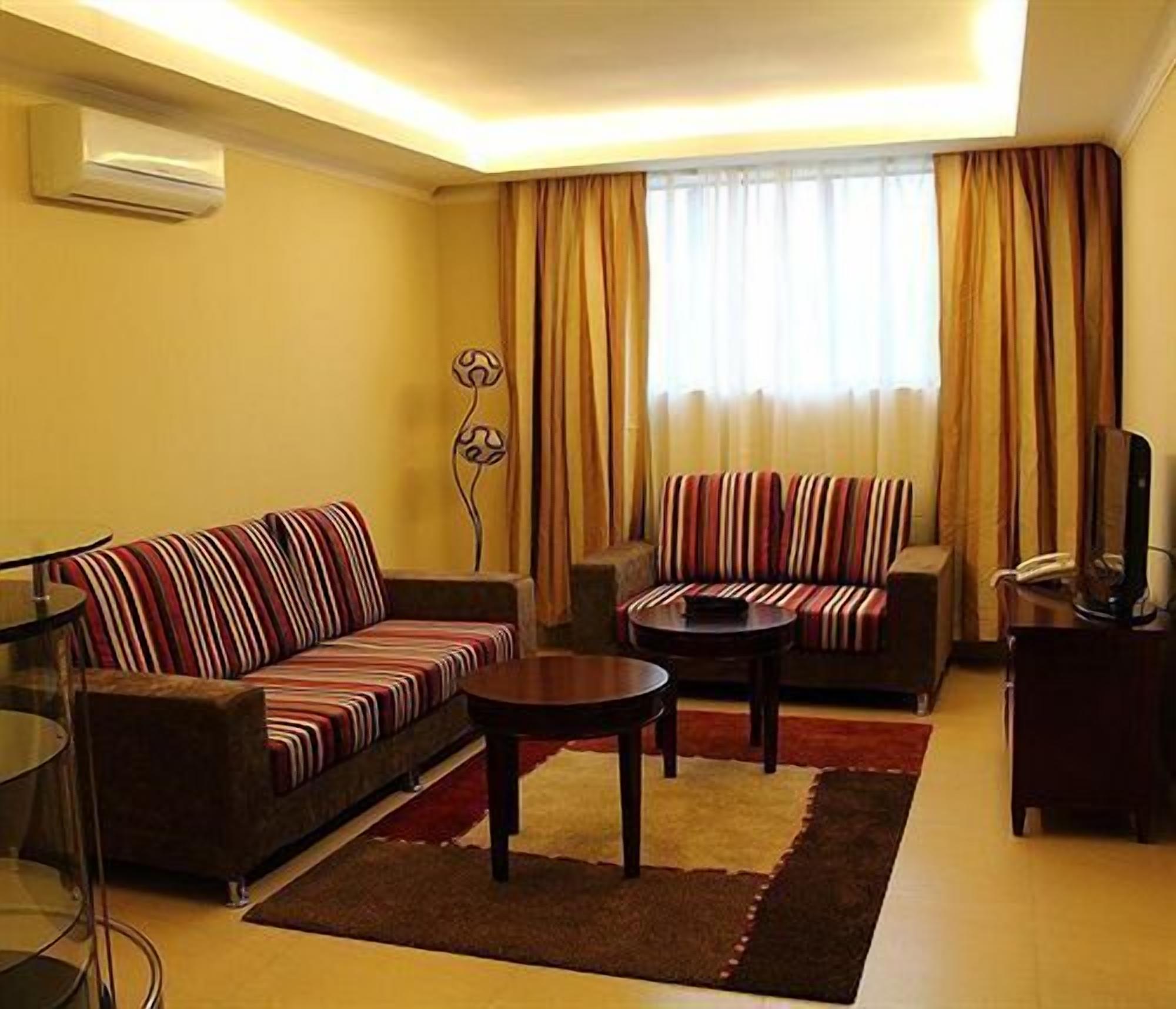 executive suite | living area | 32-inch lcd tv with satellite channels, tv