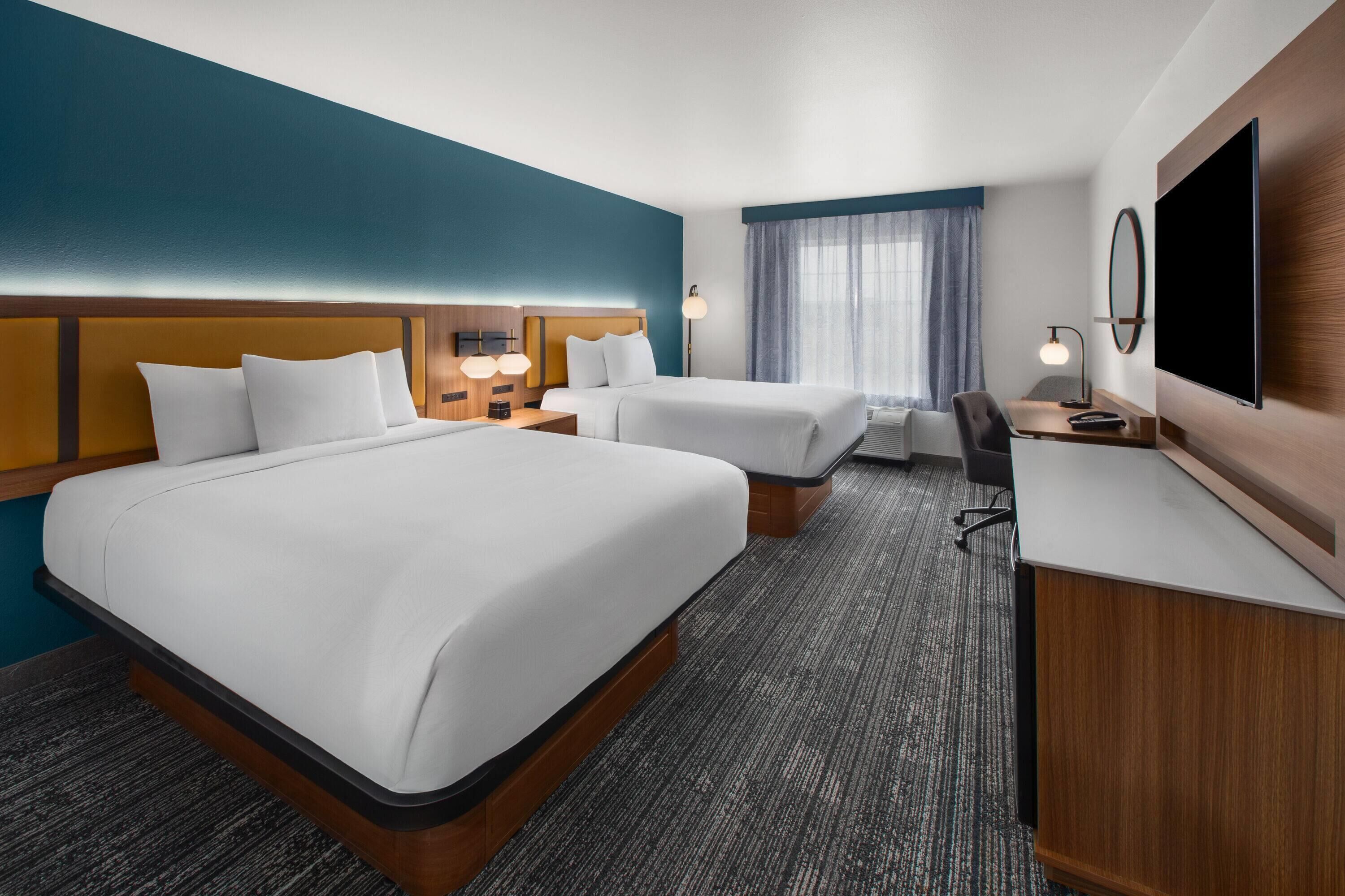 Premium bedding, down duvets, pillow-top beds, desk