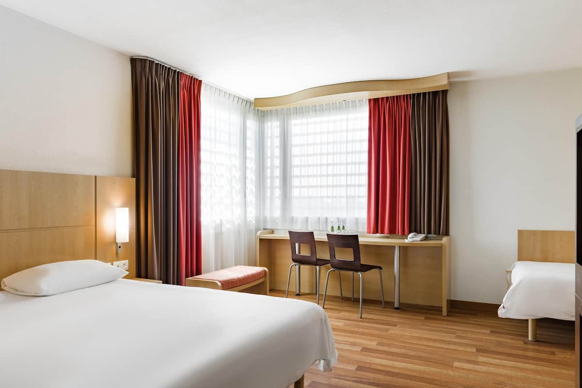 Standard Room, Multiple Beds | In-room safe, desk, soundproofing, free cribs/infant beds