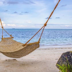 On the beach, white sand, free beach cabanas, sun-loungers