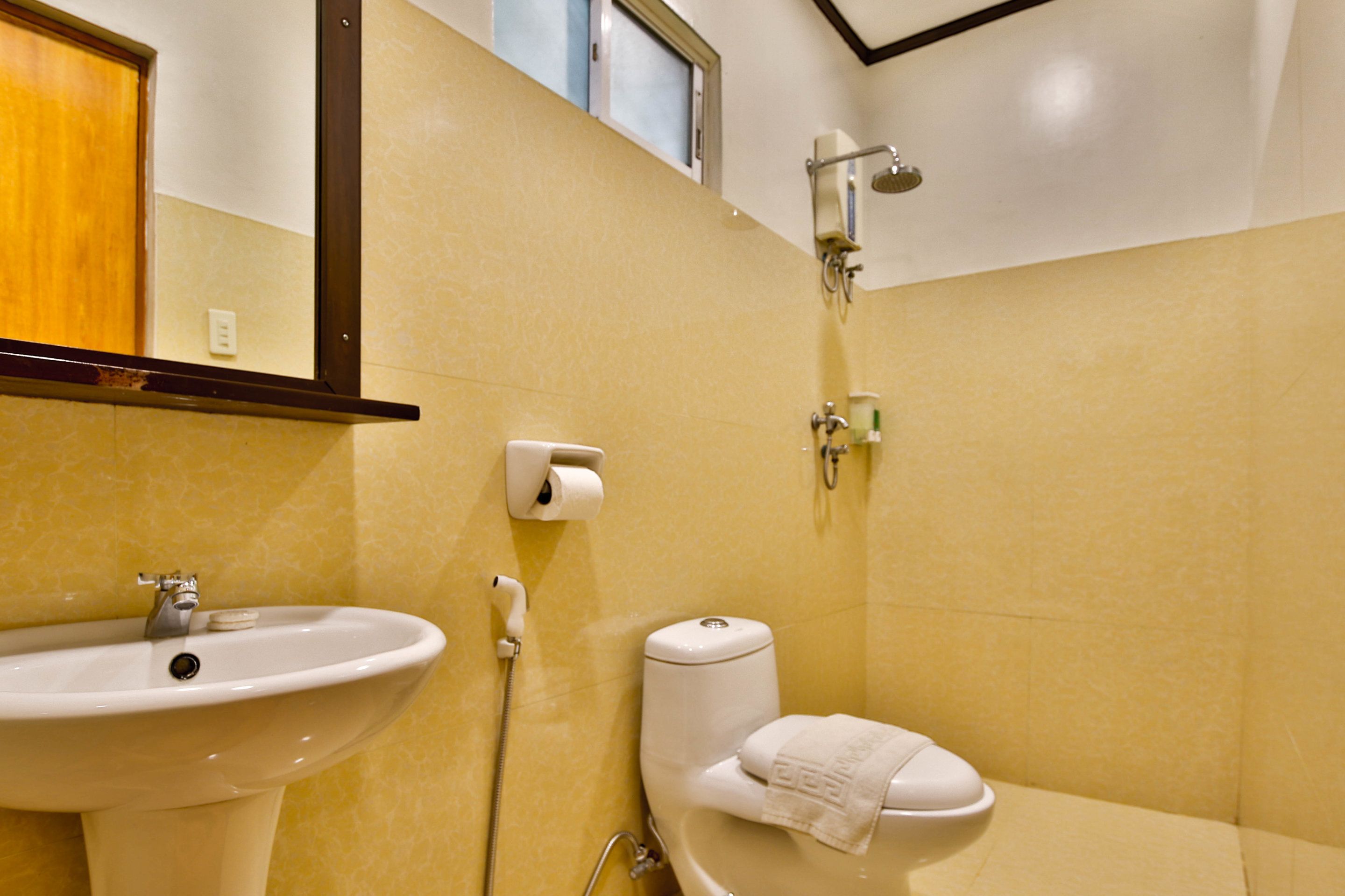 family room | bathroom | shower, hair dryer, bidet, towels