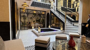 Exclusive House | Living area | 32-inch flat-screen TV with satellite channels, TV, pay movies