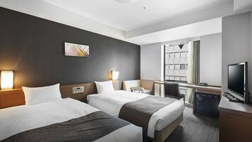 Tabla de planchar con plancha, wifi gratis y ropa de cama