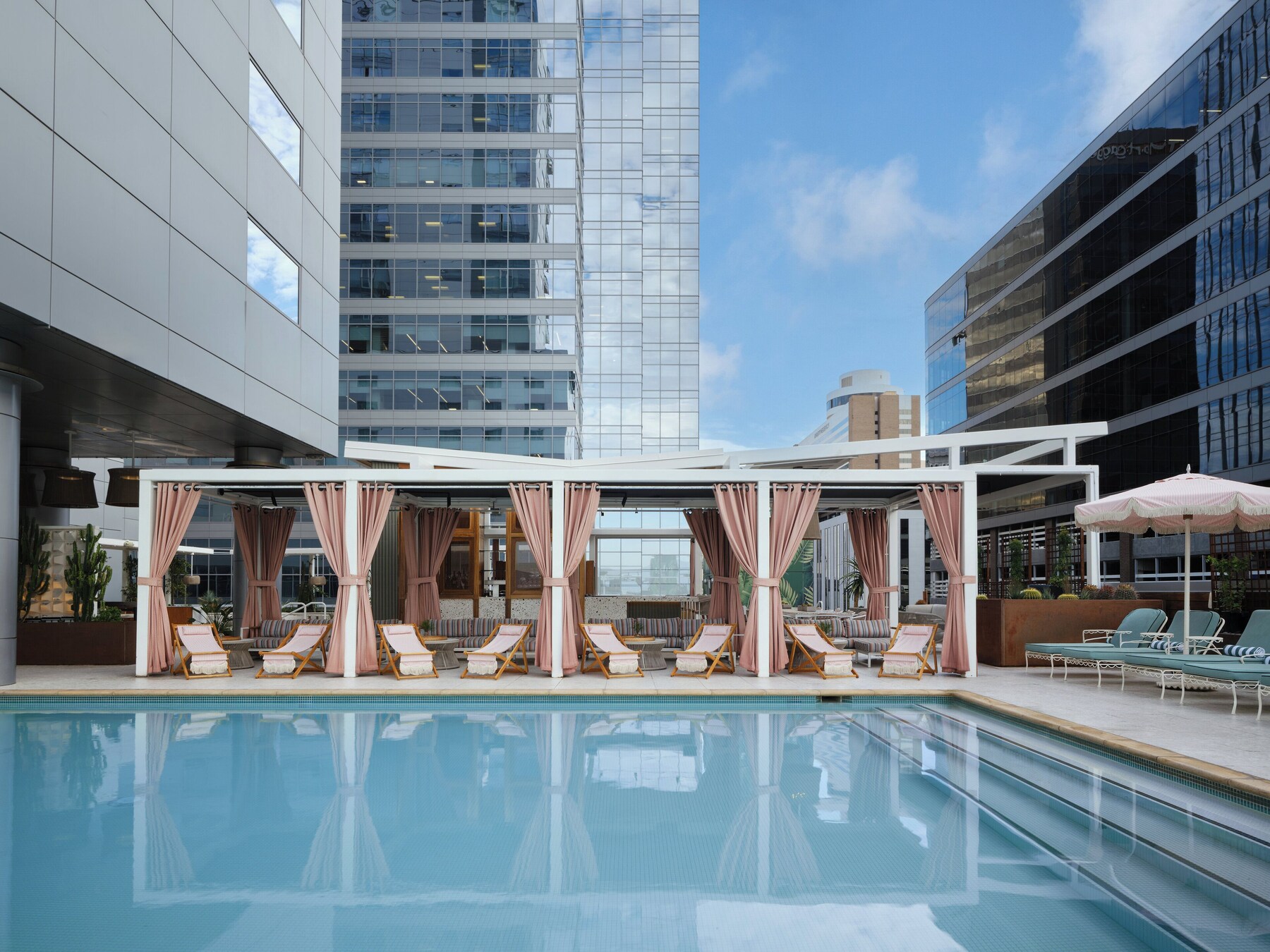 Outdoor pool, open 6:00 AM to 9:00 PM, cabanas (surcharge)