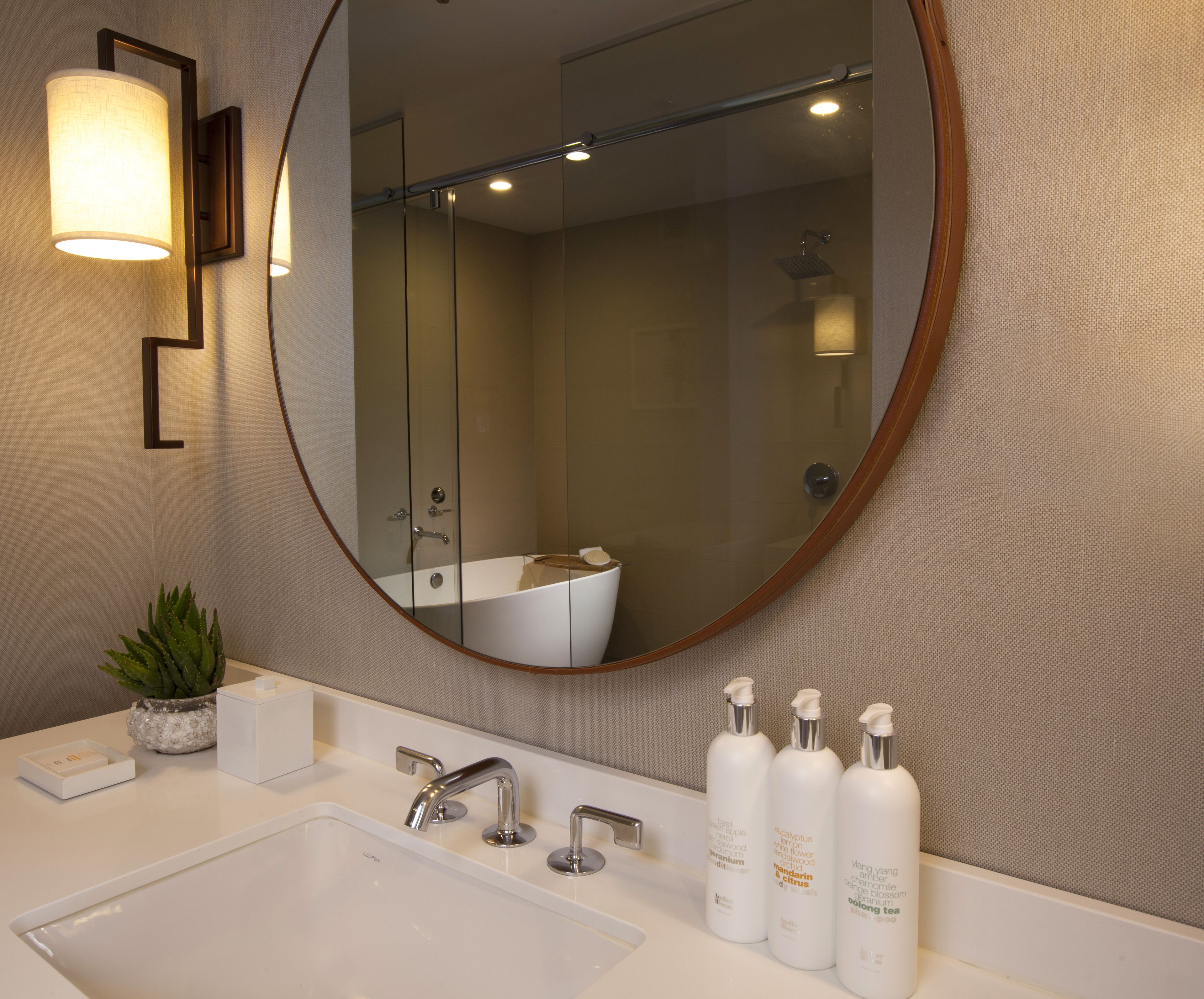 designer toiletries, hair dryer, bathrobes, towels