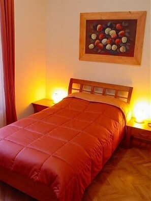 Habitación individual estándar, 1 cama individual | Caja fuerte, decoración individual, mobiliario individual y escritorio