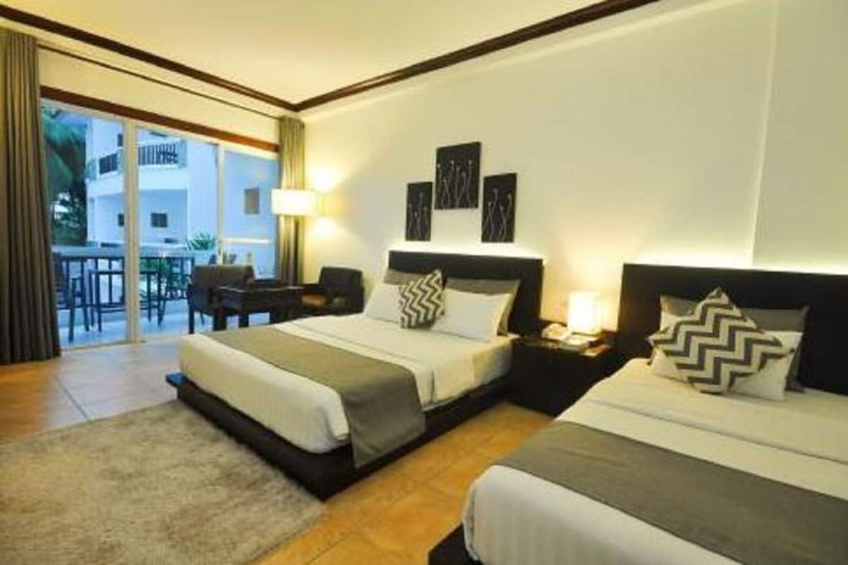 Literie hypoallergénique, minibar, coffres-forts dans les chambres