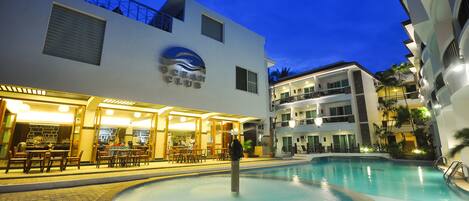 2 outdoor pools, open 8:00 AM to 10:00 PM, pool umbrellas, sun loungers