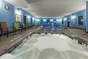 A pool area with lounge chairs, a lifeguard sign, and a pool depth marker. - Staybridge Suites Amarillo - Western Crossing by IHG (Amarillo)
