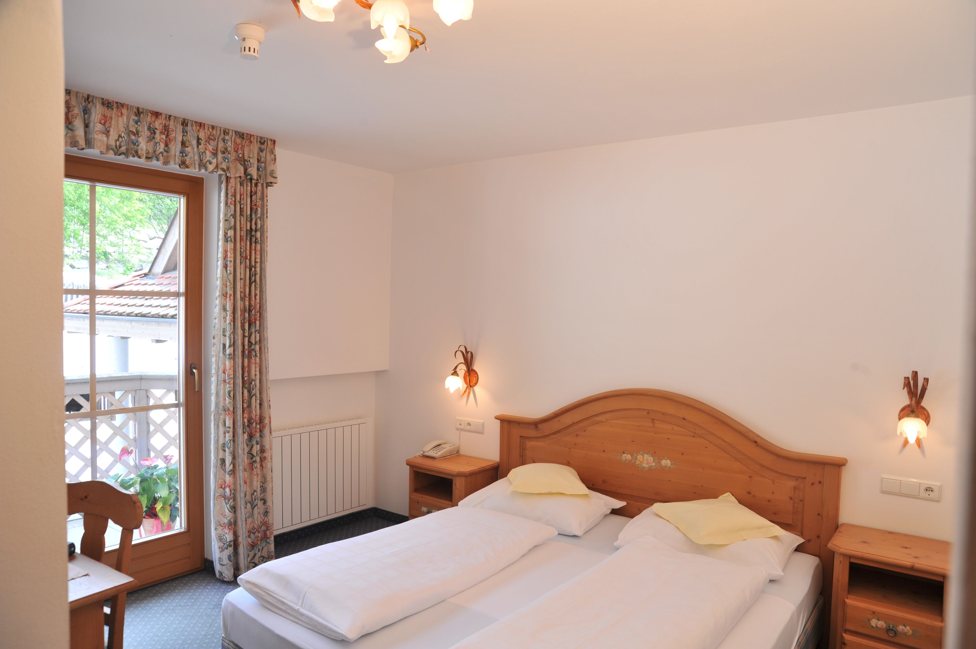 economy double room | premium bedding, select comfort beds, in-room safe, desk