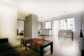 Comfort Apartment, Garden View | Living area | 26-inch flat-screen TV with satellite channels, LCD TV