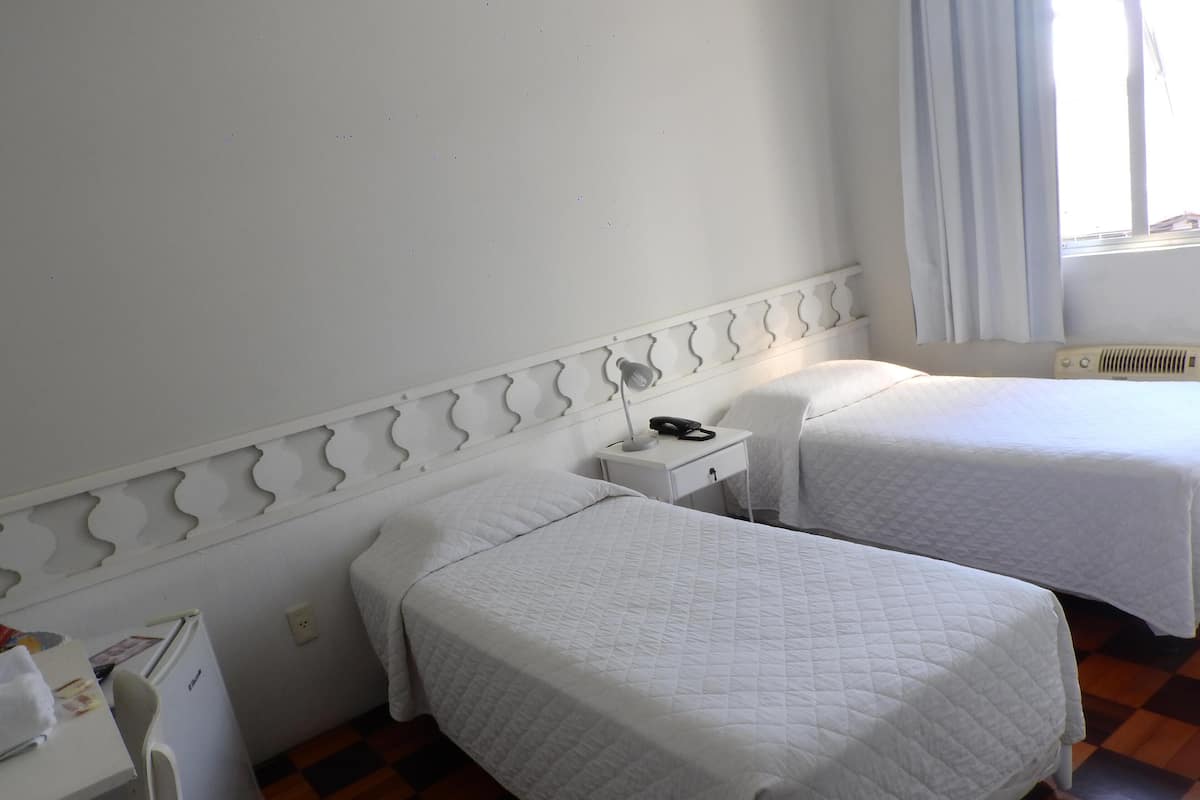 Minibar, desk, WiFi (free), bed sheets