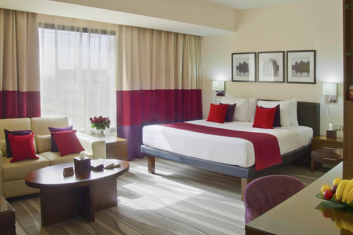 Junior Suite, 1 King Bed | Premium bedding, minibar, in-room safe, individually furnished