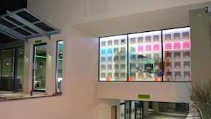 A modern building with large windows and a glass facade. - Mesami Hotel (Durban)
