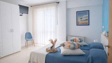 Departamento superior, 2 habitaciones | Caja de seguridad en la habitación y insonorización