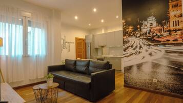 Apartment, 2 Bedrooms (4 pax) | Living area | 47-inch TV with cable channels