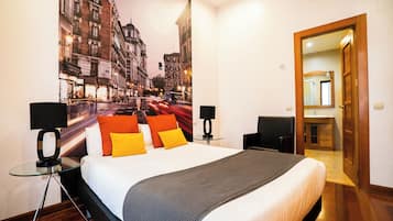 Down comforters, memory foam beds, desk, iron/ironing board