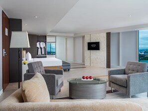 Junior Suite | Premium bedding, minibar, in-room safe, desk - Aston Makassar Hotel & Convention Center (Makassar)