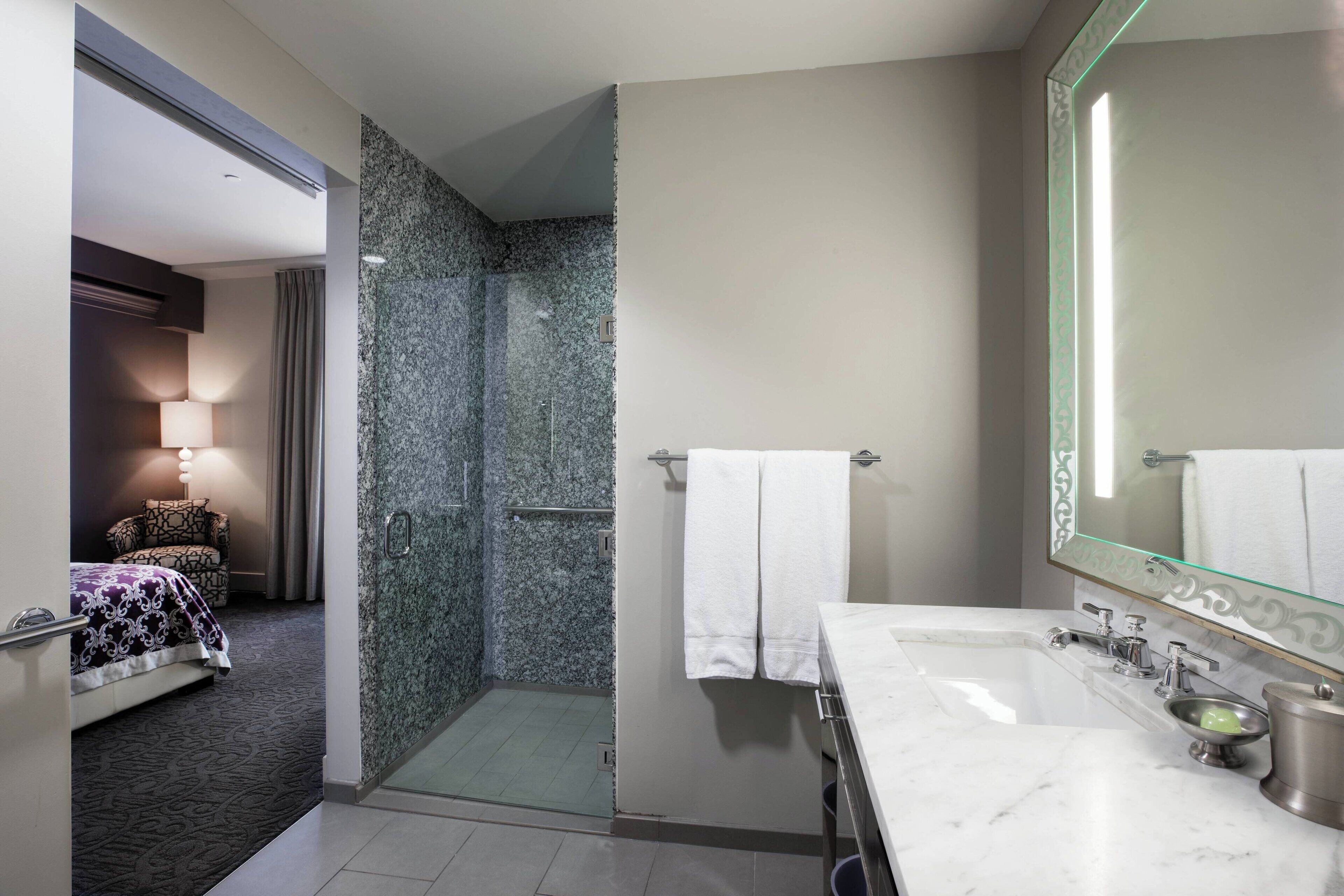room, 1 king bed | bathroom | shower, designer toiletries, hair dryer, bathrobes