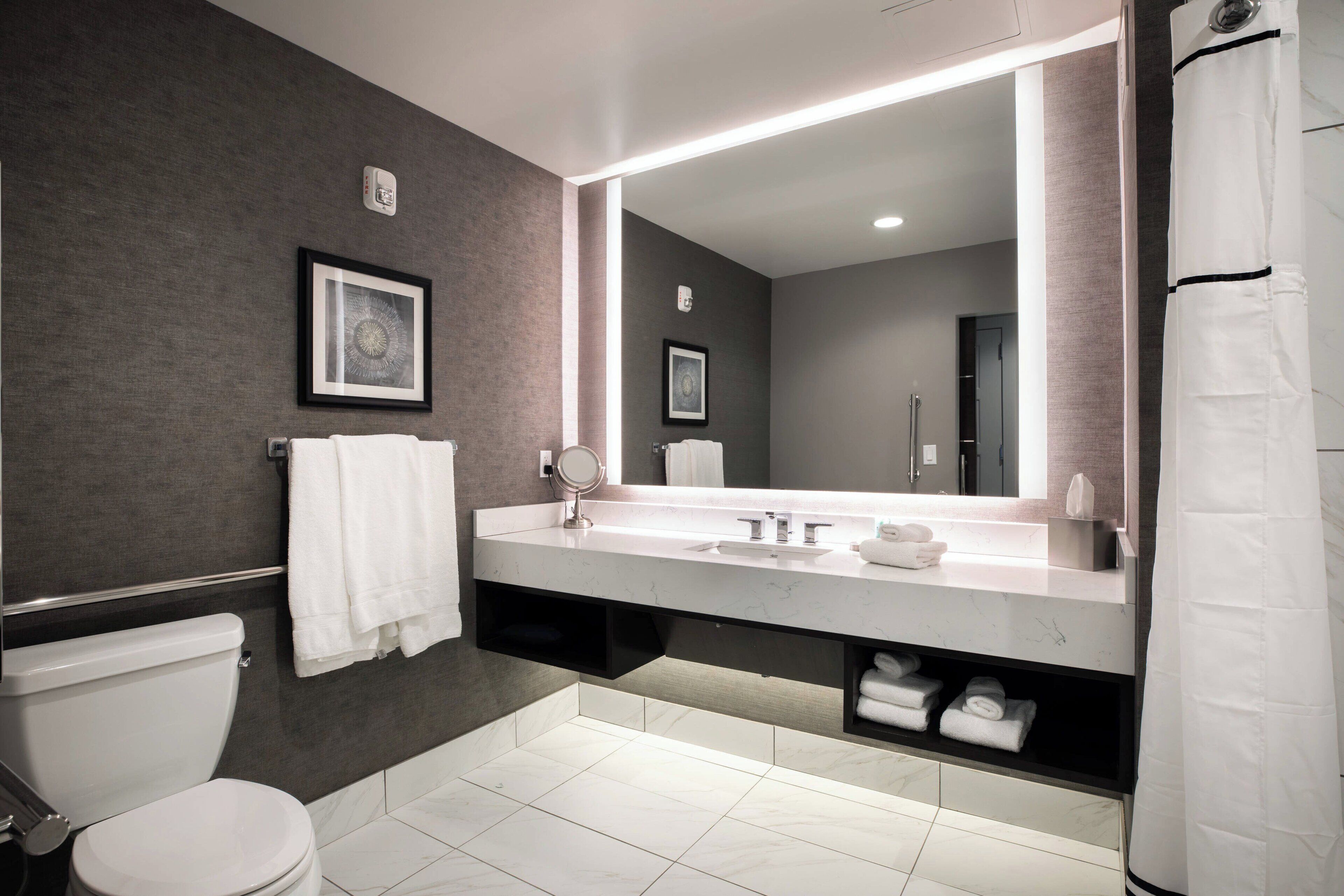 room, 1 king bed | bathroom | shower, designer toiletries, hair dryer, bathrobes