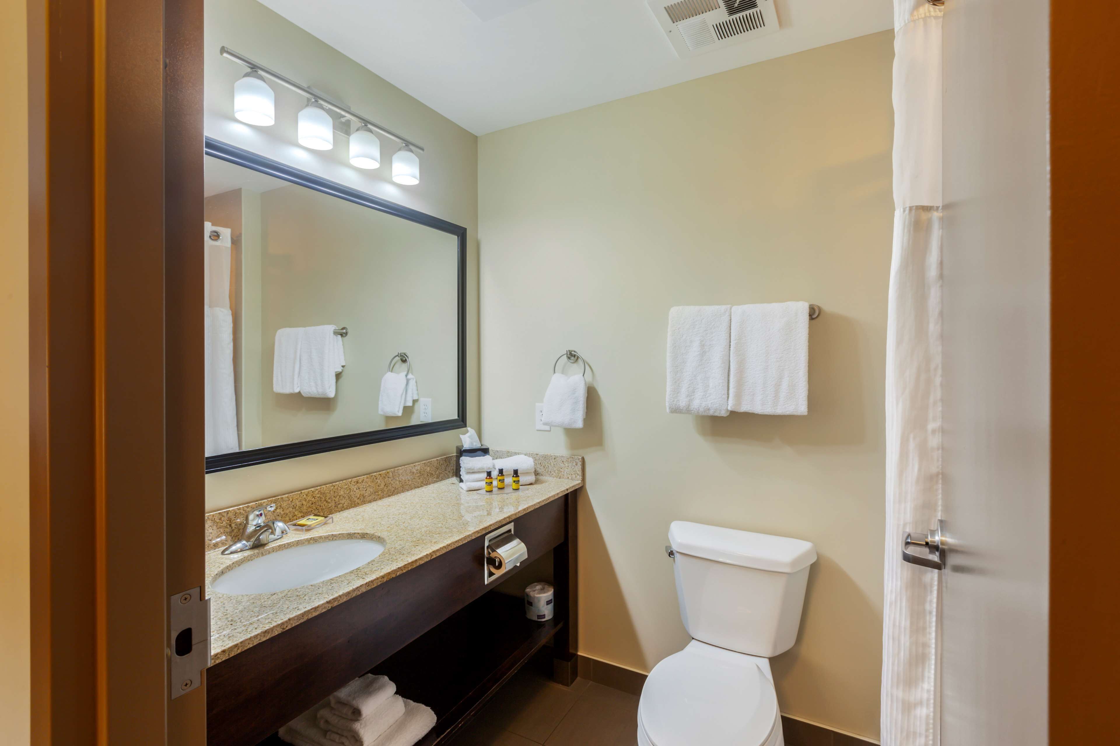 suite, 2 queen beds, non smoking, refrigerator & microwave (with sofabed) | bathroom | free toiletries, hair dryer, towels