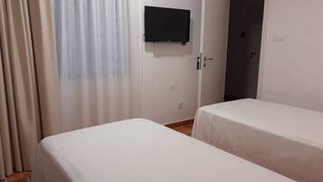 Double or Twin Room, Courtyard View, Courtyard Area (2 people) | Minibar, in-room safe, individually furnished, desk