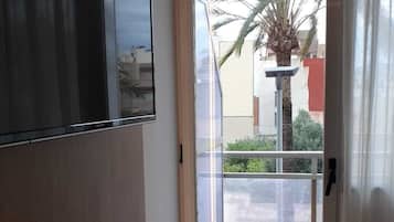 Double or twin room with terrace, 2 people | Living area | TV