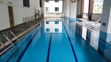 Indoor pool, open 7:30 AM to 7:30 PM, pool loungers