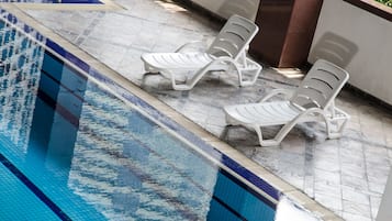 Indoor pool, open 7:30 AM to 7:30 PM, sun loungers