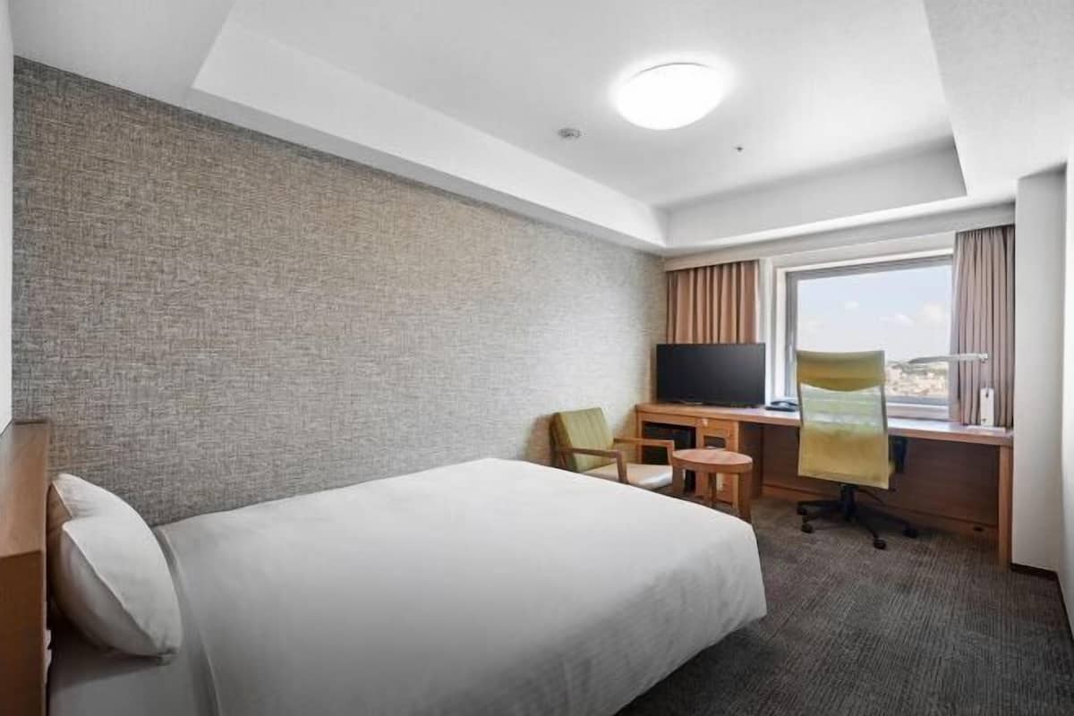 Down comforters, desk, blackout drapes, soundproofing