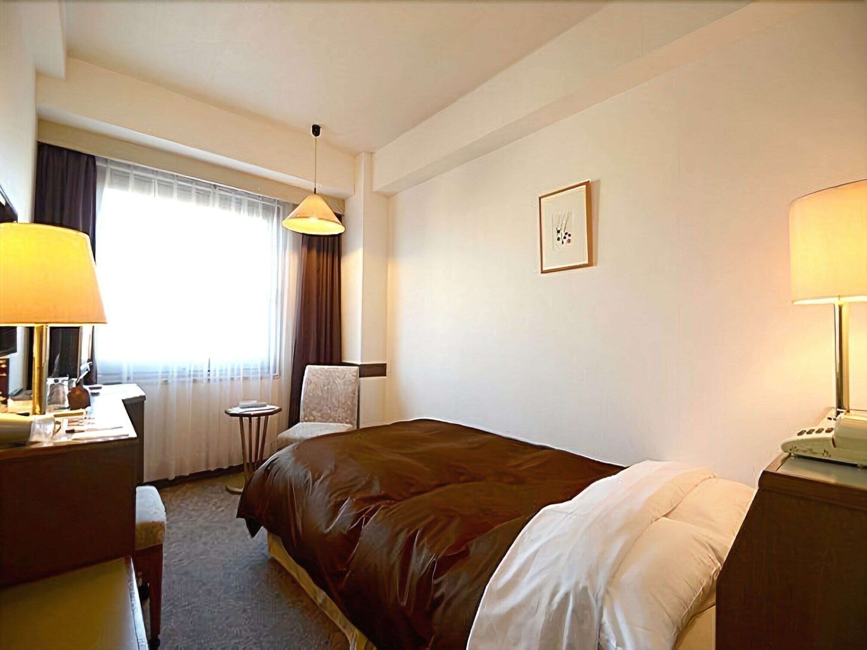 desk, blackout curtains, free wifi, bed sheets