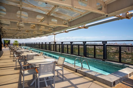 Outdoor pool, pool umbrellas, sun loungers