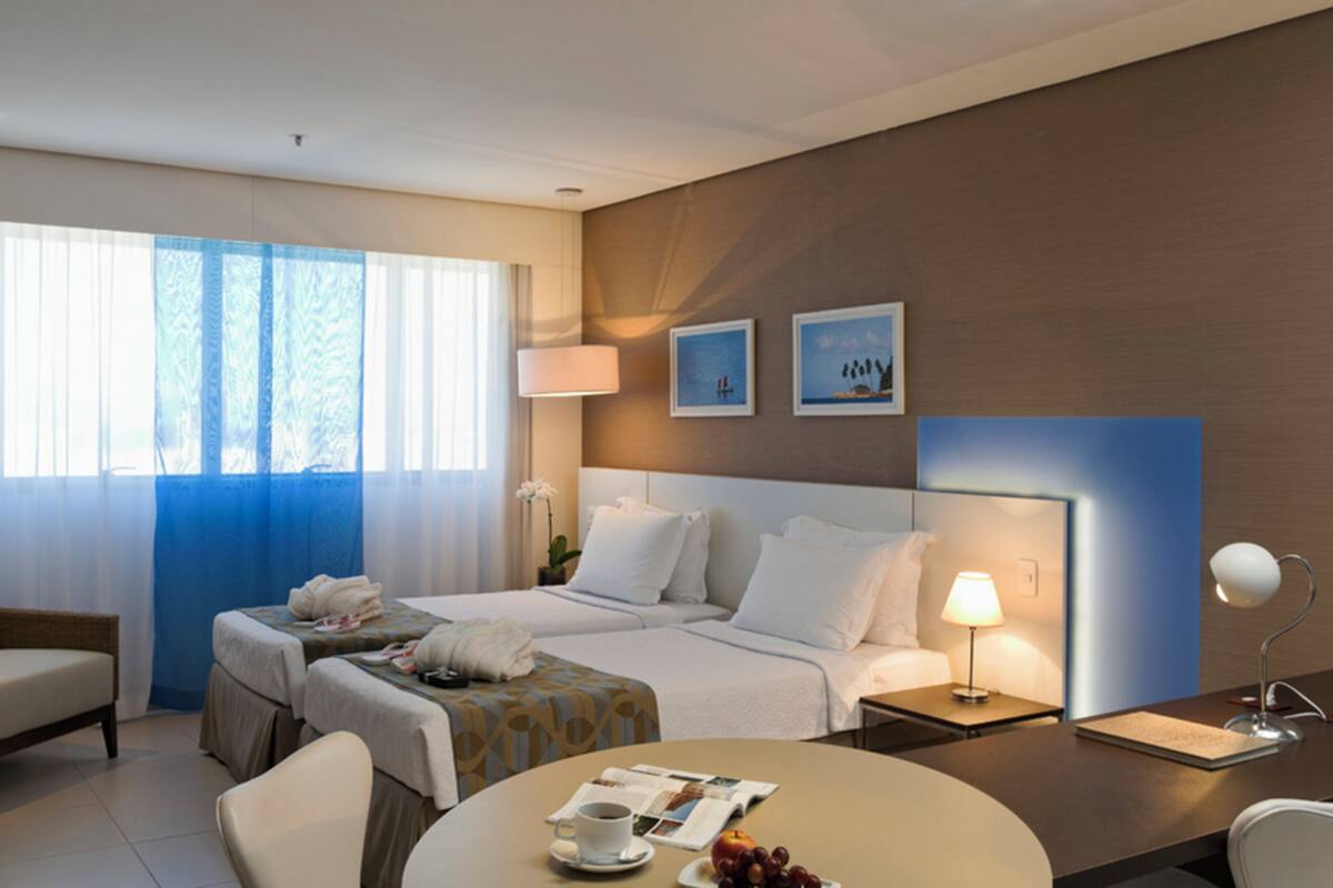 Standard Twin - 2 Camas Solteiro | Minibar, in-room safe, blackout curtains, free WiFi