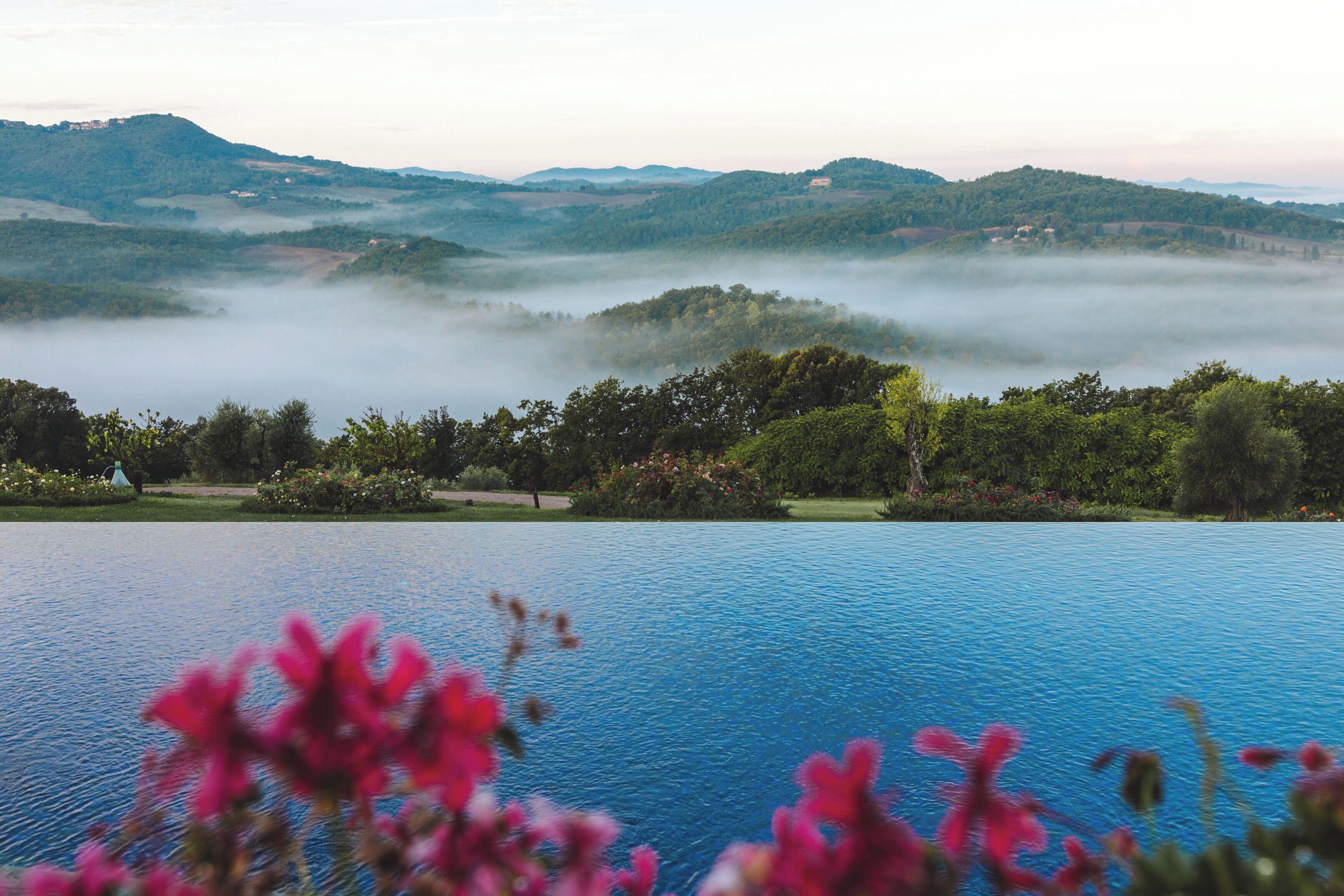 Outdoor pool, pool umbrellas, sun loungers
