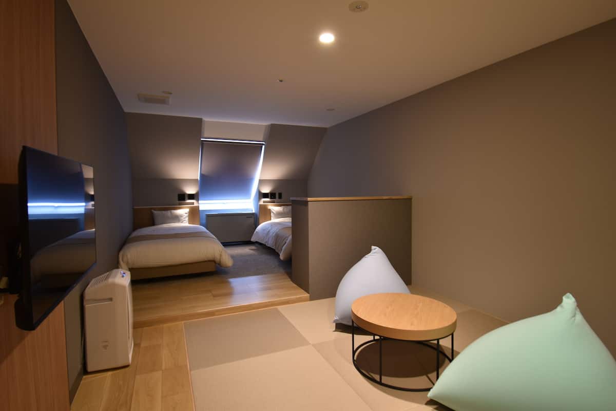 Premium Family room, 2 Single Beds, Non Smoking | Premium bedding, down comforters, blackout drapes, free WiFi