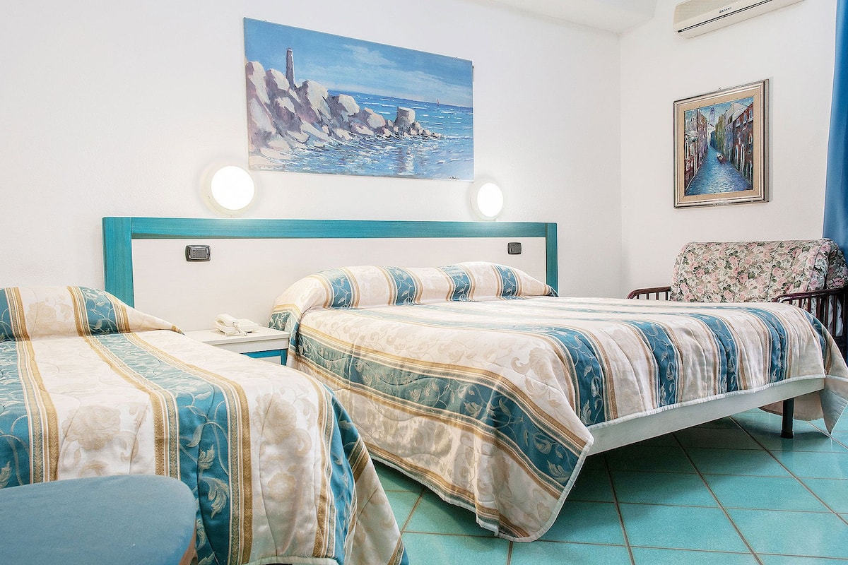 Triple Room | Memory-foam beds, in-room safe, desk, blackout curtains