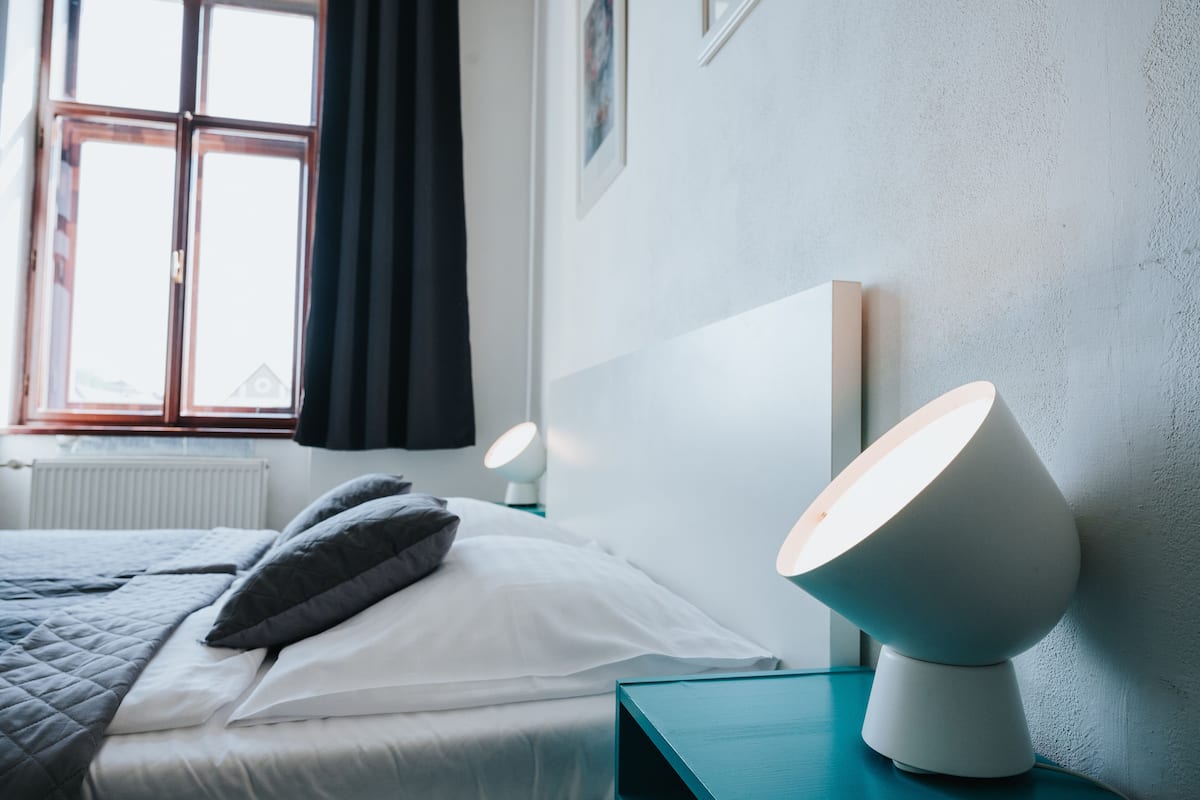 economy room, 1 queen bed | 1 bedroom, desk, laptop workspace, blackout curtains