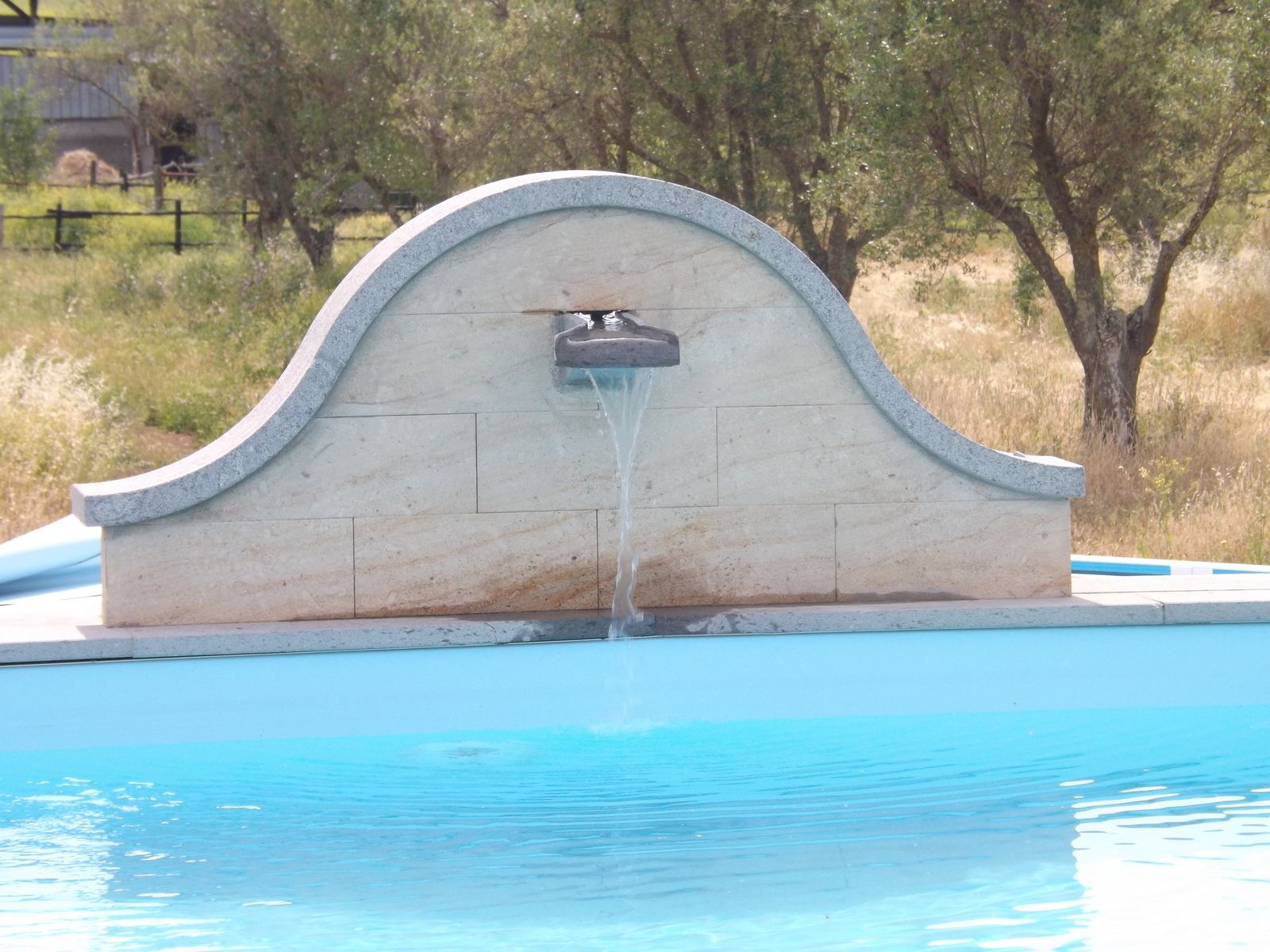 Seasonal outdoor pool, open 10 AM to 7:30 PM, pool umbrellas