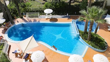 Seasonal outdoor pool, open 10:00 AM to 7:00 PM, pool umbrellas