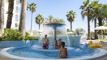Seasonal outdoor pool, open 10:00 AM to 7:00 PM, pool umbrellas