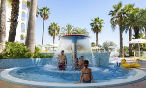Seasonal outdoor pool, open 10:00 AM to 7:00 PM, pool umbrellas