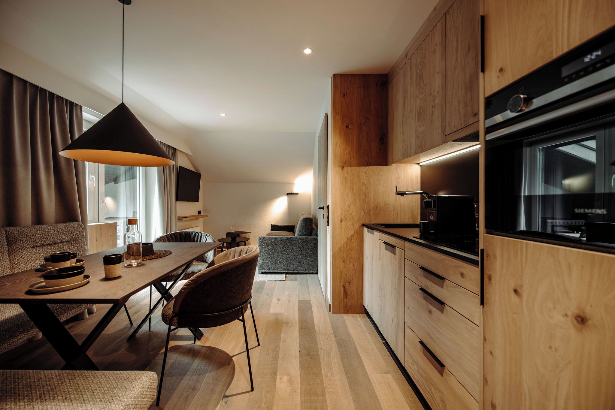 comfort apartment, 2 bedrooms, balcony, mountainside (70 eur cleaning fee) | living area | flat-screen tv, toys, books