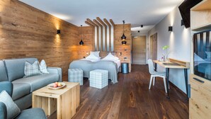 Suite (Dolomit) | Sengetøy av topp kvalitet, minibar, safe på rommet og wi-fi (inkludert)