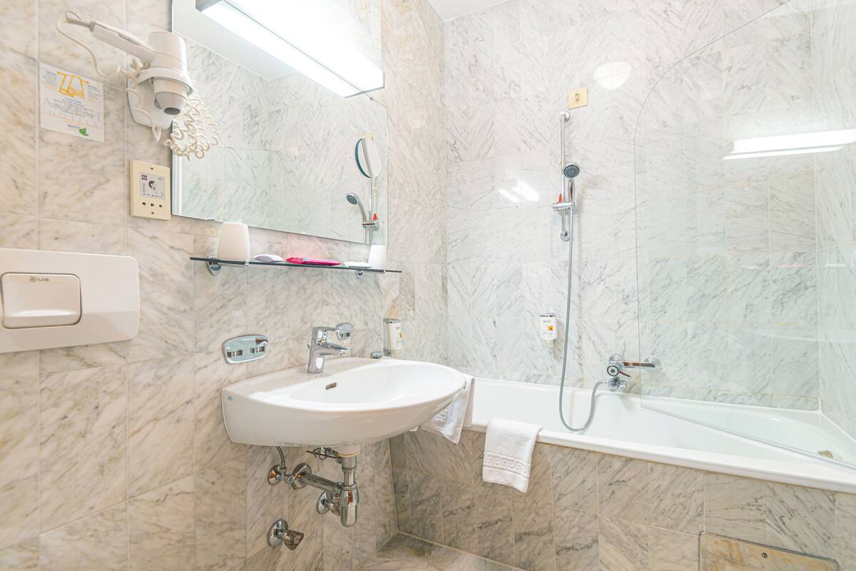 hair dryer, slippers, towels