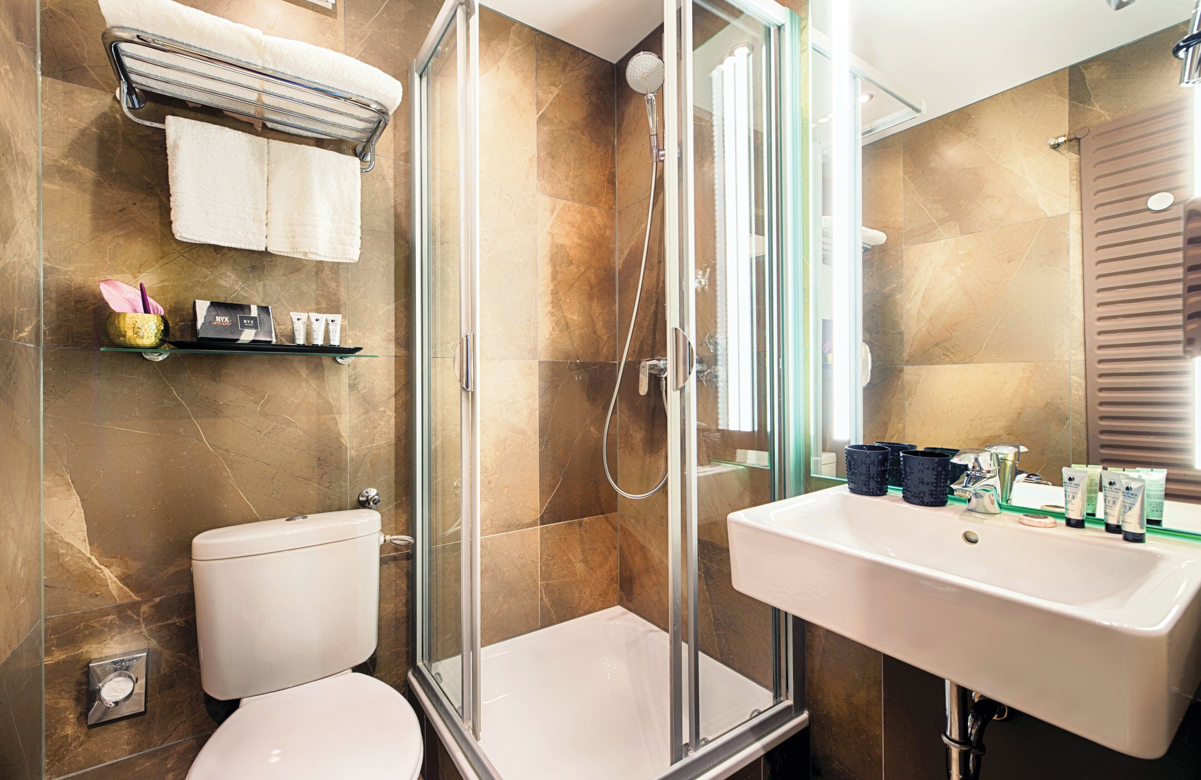 economy room | bathroom | free toiletries, hair dryer, towels
