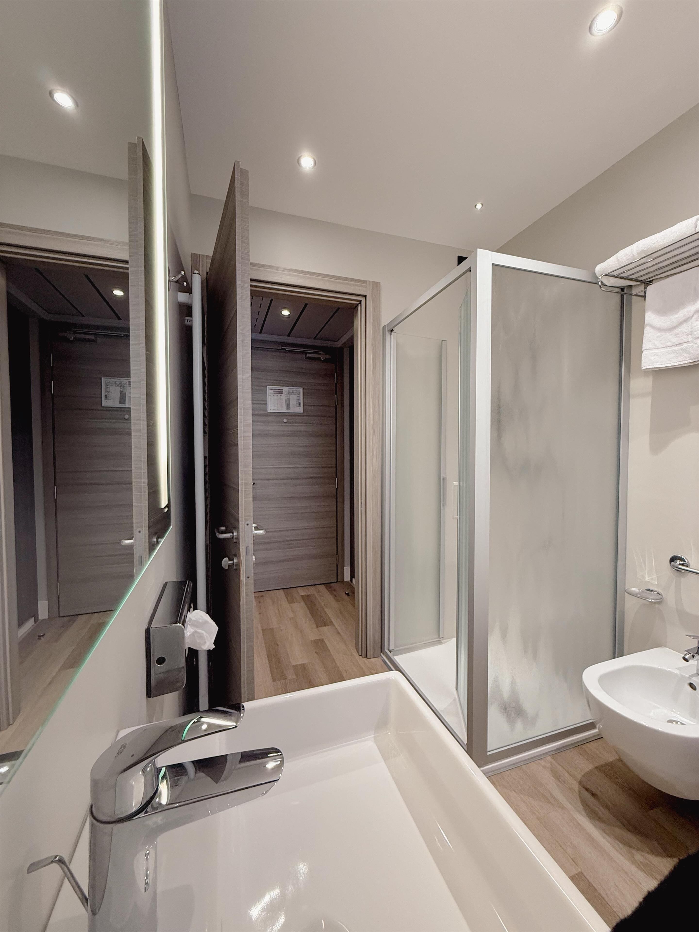 shower, free toiletries, bidet, towels