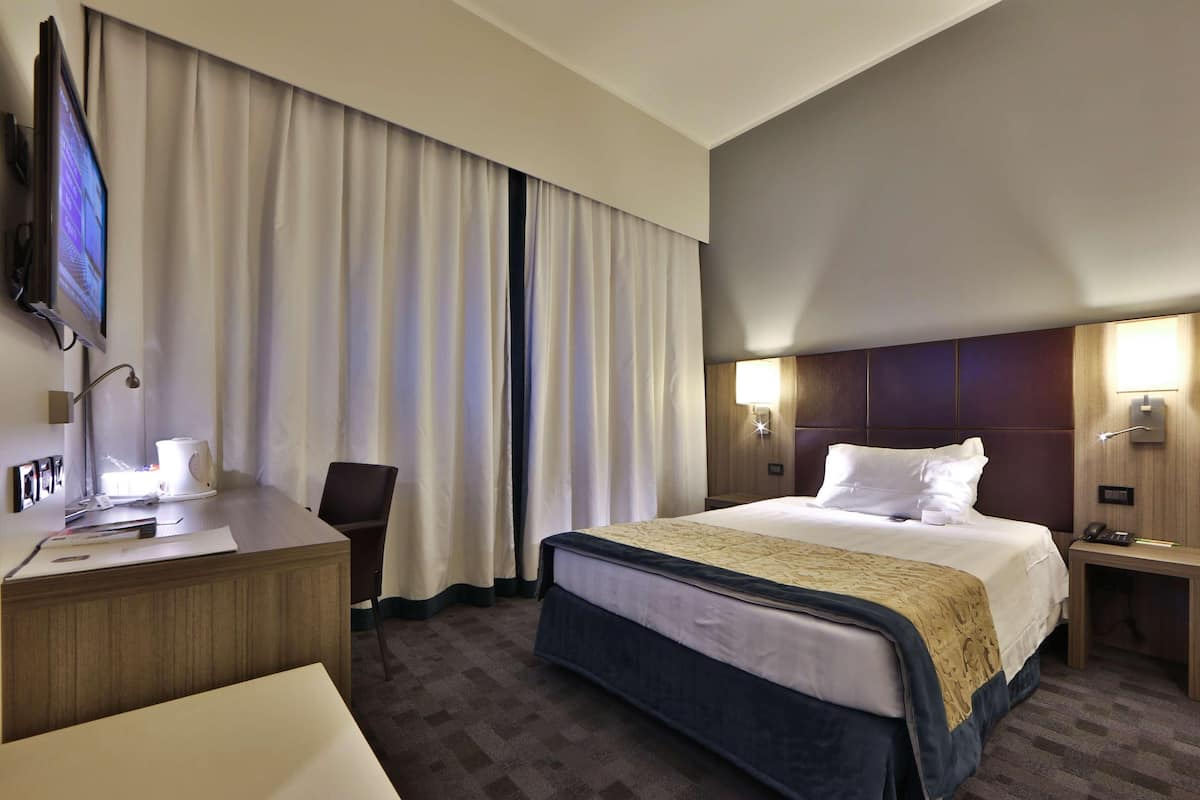 Down duvets, minibar, in-room safe, desk