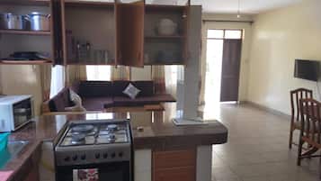 Full-sized fridge, microwave, dining tables